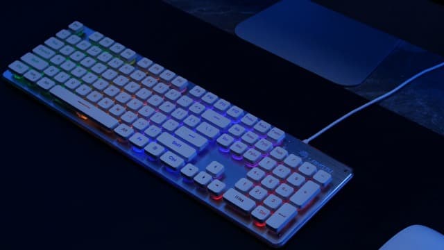 LANGTU Membrane Gaming Keyboard, Rainbow LED Backlit Quiet Keyboard for Office, USB Wired All-Metal Panel 25 Keys Anti-ghosting Computer Keyboard 104 Keys - L1 White/Silver